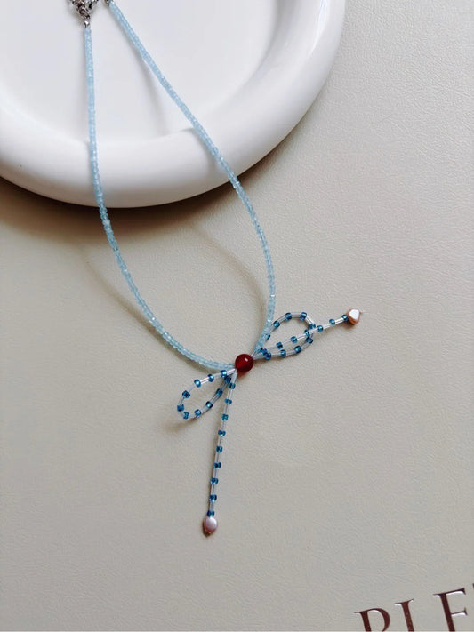 Blue Bow Pearl Beaded Necklace - Lumivault