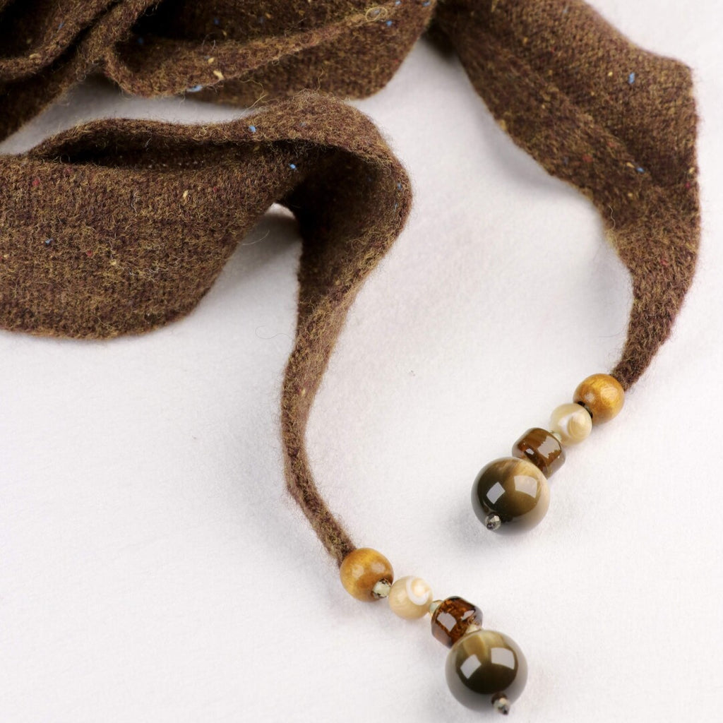Woven Warmth Hand‑Knitted Wool Triangle Scarf,Lumivault.