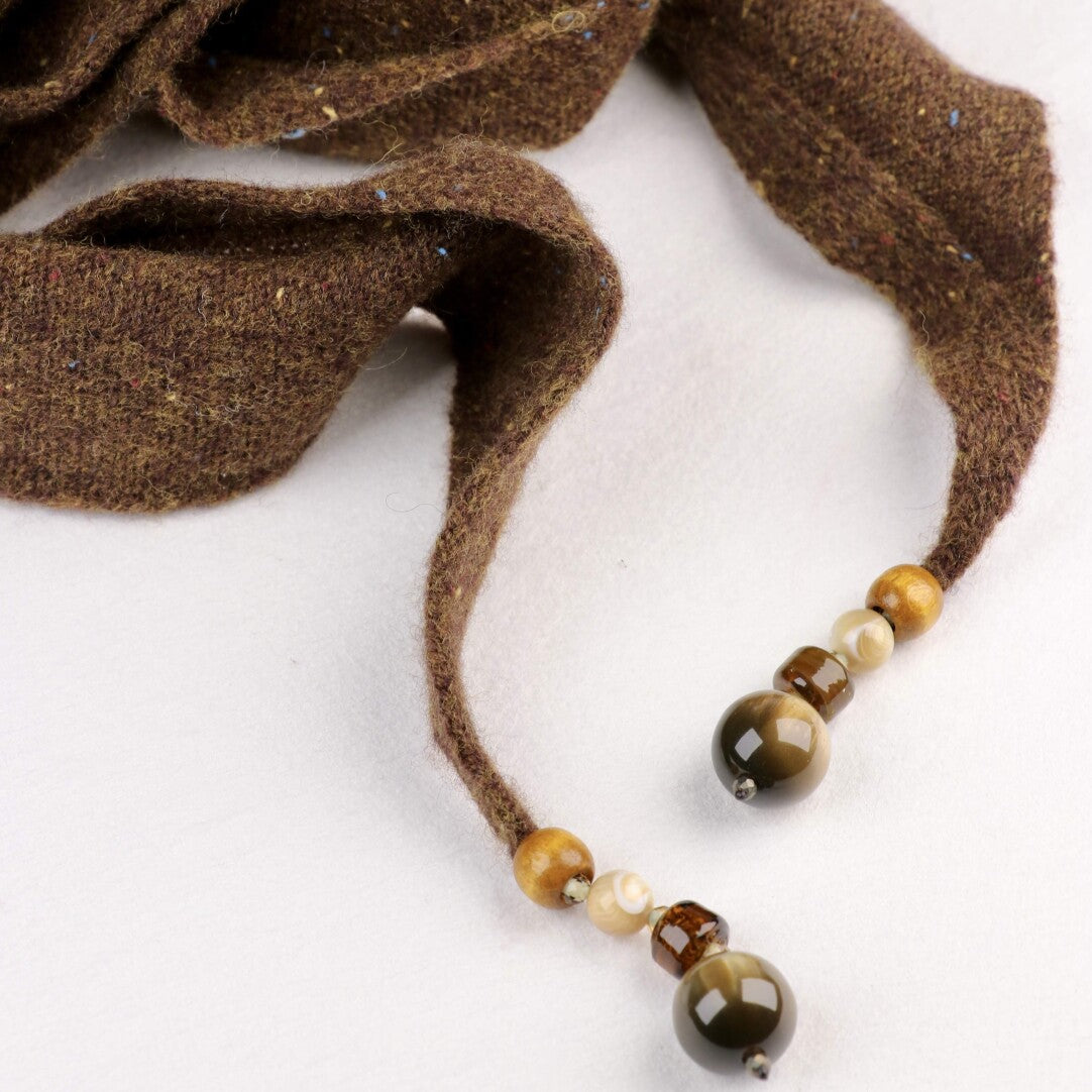 Woven Warmth Hand‑Knitted Wool Triangle Scarf,Lumivault.