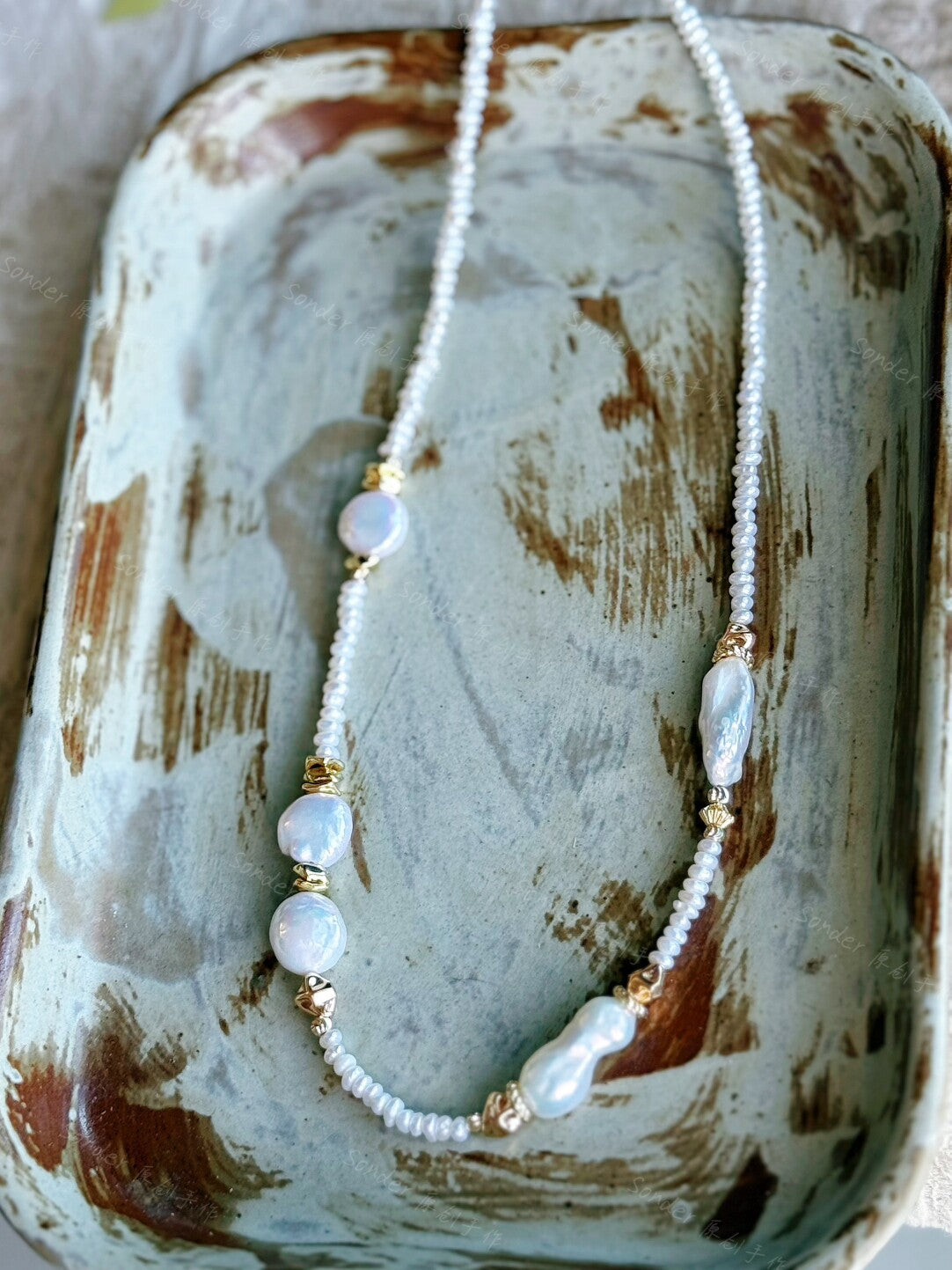 At The Neckline Colorful Baroque Pearl Necklace