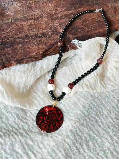 Seven Crows Lacquer Obsidian Deer Bone Necklace