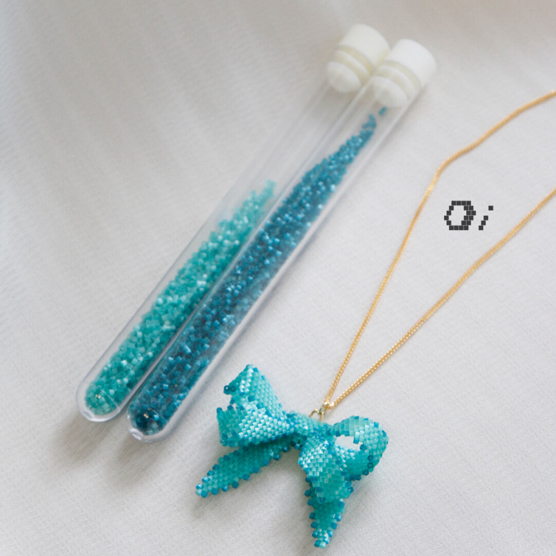 Blue Bow Beaded Necklace
