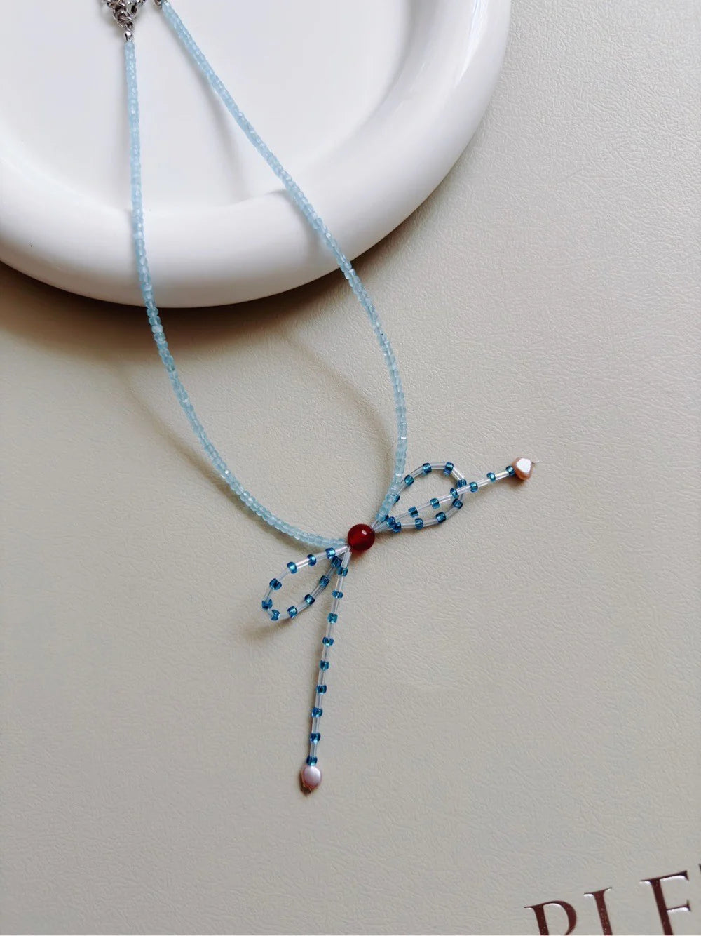 Blue Bow Pearl Beaded Necklace - Lumivault