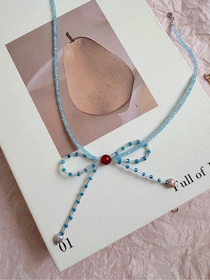 Blue Bow Pearl Beaded Necklace - Lumivault
