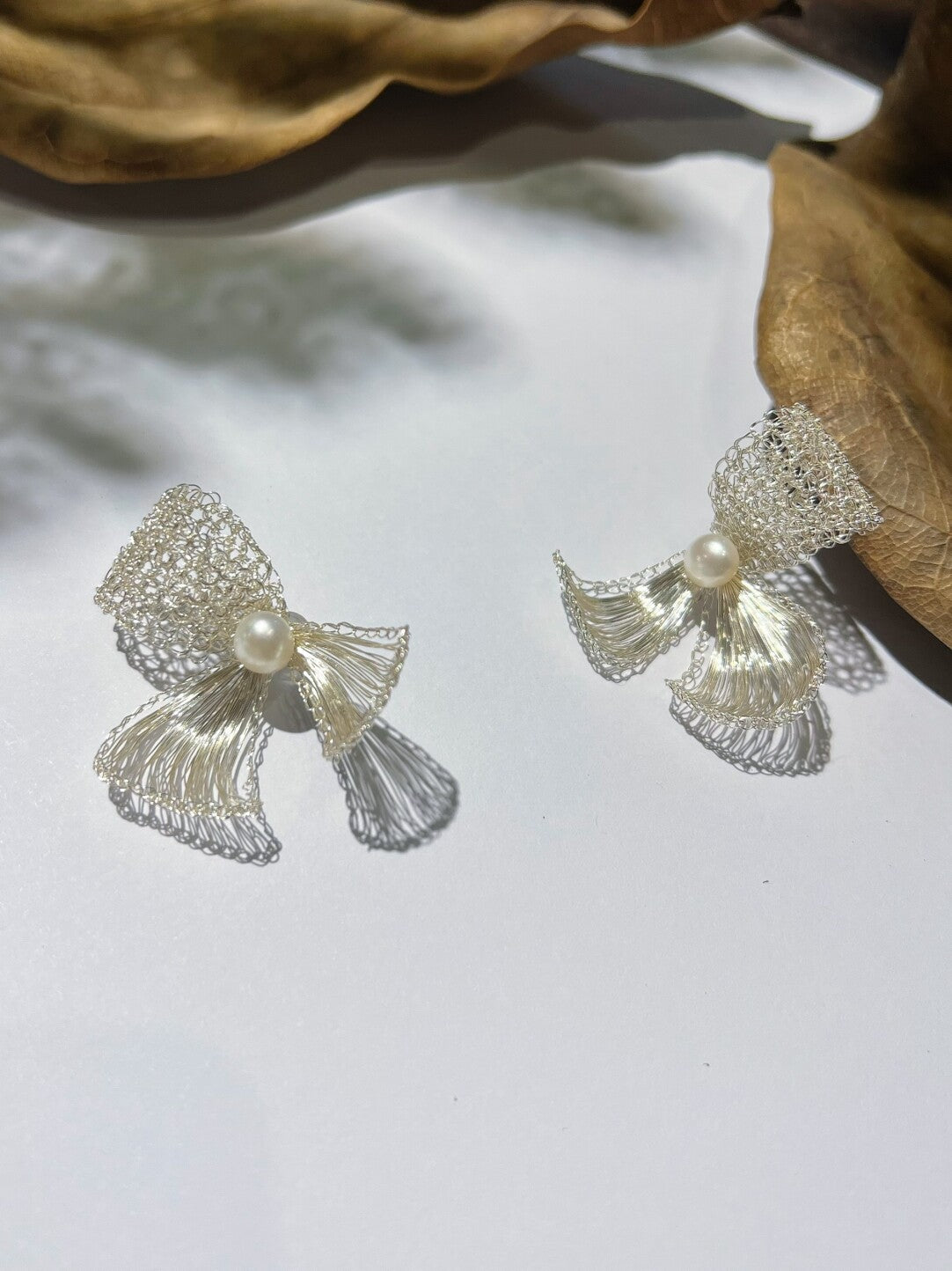 Metal Woven Bow Natural Pearl Earrings,Lumivault.
