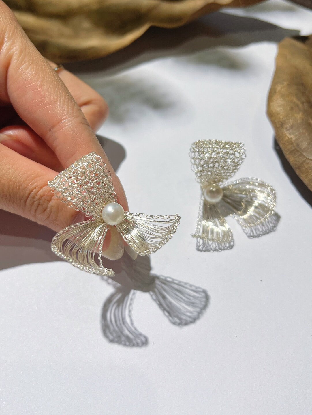 Metal Woven Bow Natural Pearl Earrings,Lumivault.