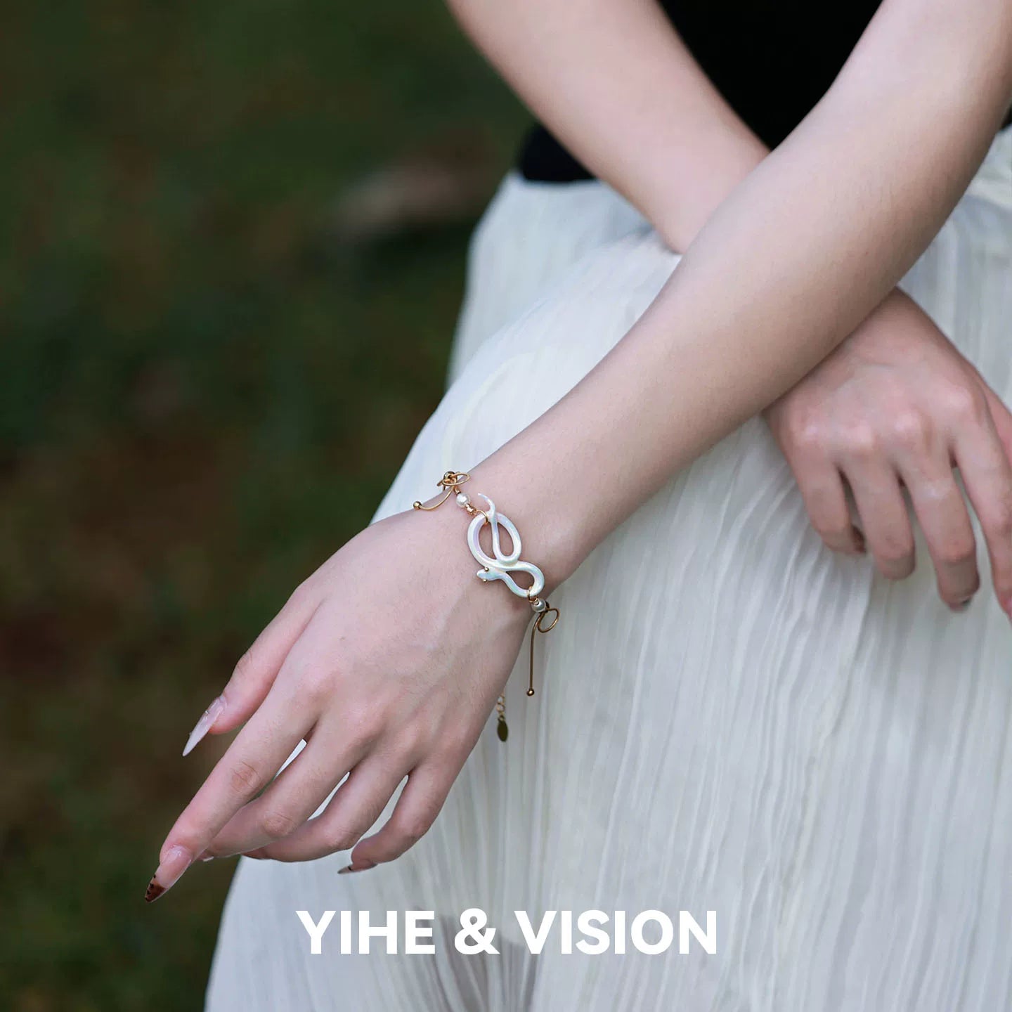 Floating Light White Snake Ceramic Bracelet,Lumivault.