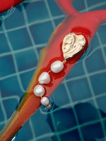 Lost in Echo Heart Pearl Earrings