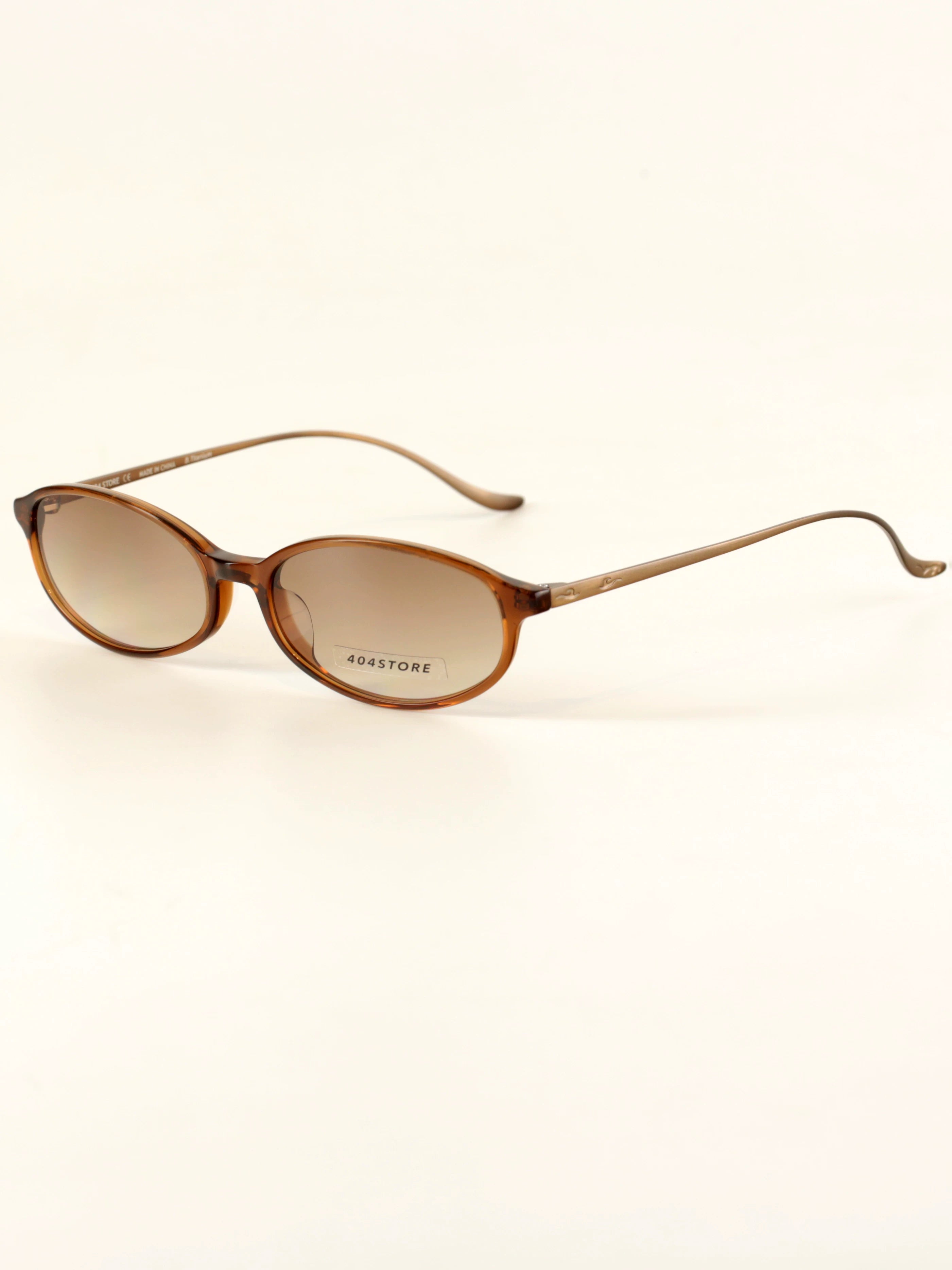 Rouge Oval Titanium Sunglasses - Lumivault