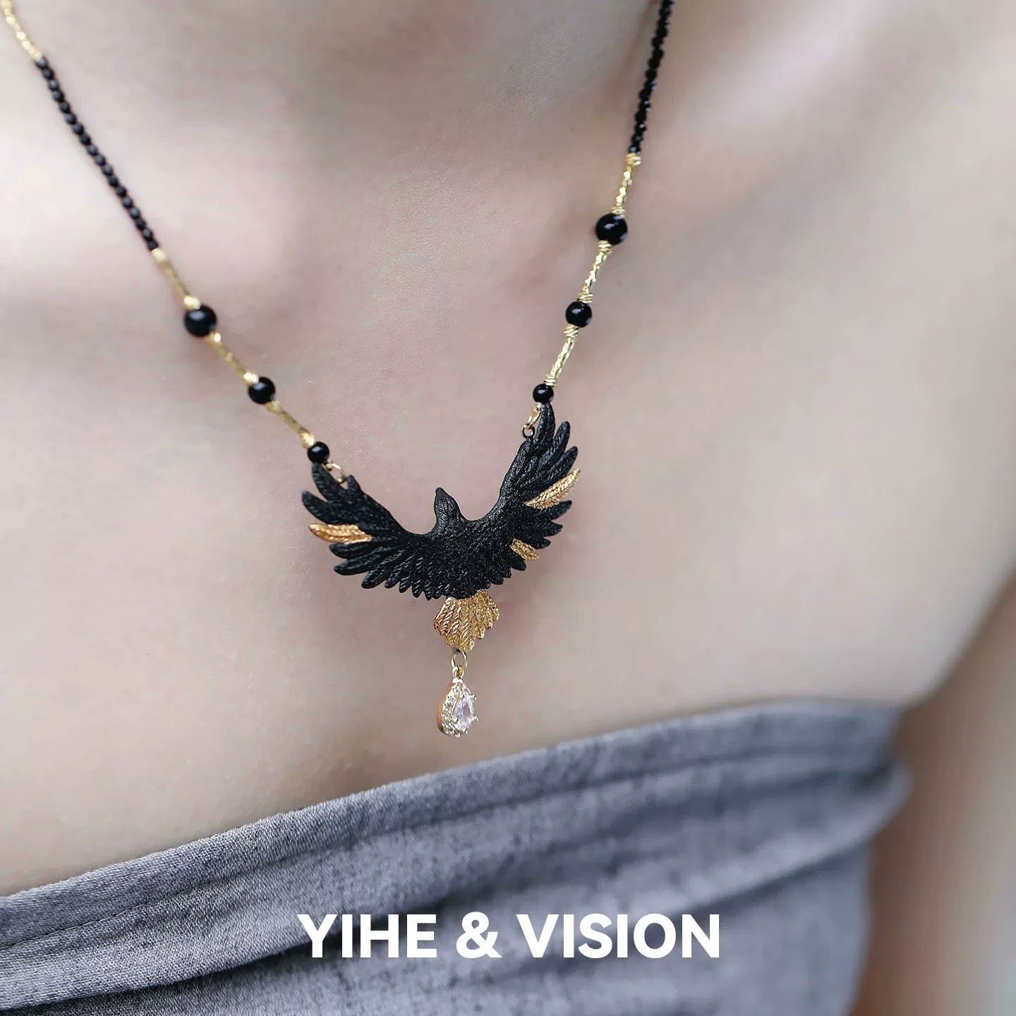 Gold-tailed Black Eagle Ceramic Necklace