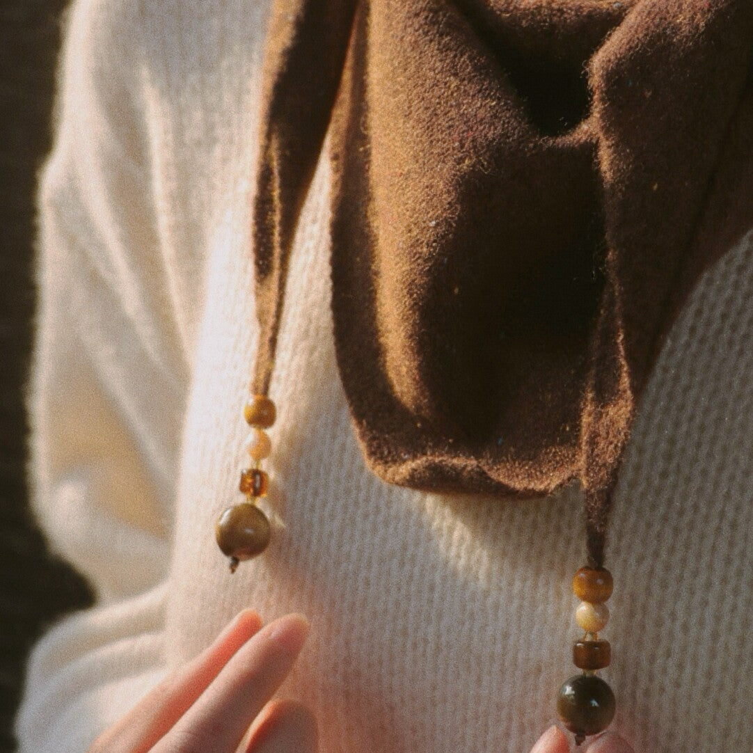 Woven Warmth Hand‑Knitted Wool Triangle Scarf,Lumivault.