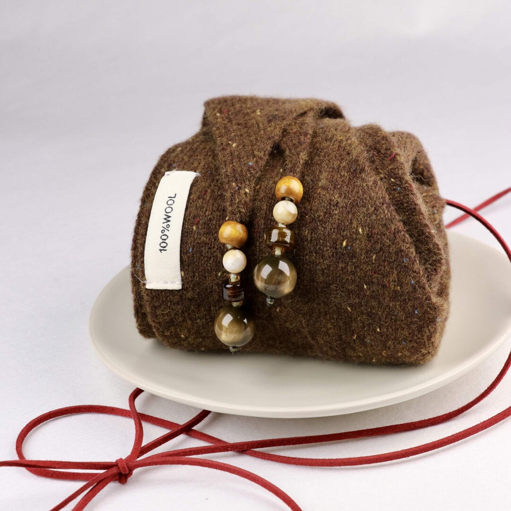 Woven Warmth Hand‑Knitted Wool Triangle Scarf,Lumivault.